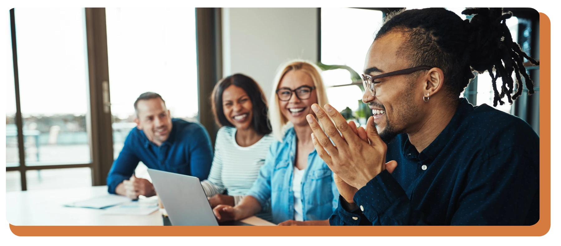 four people discussing about business plans